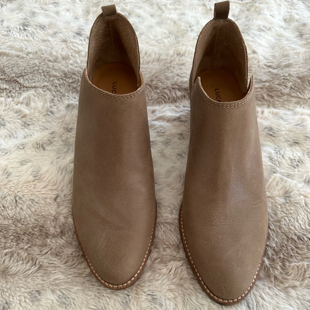 NWOT - Lucky Brand Fayth Booties. Size 9. Fossilized Leather color. Never worn!